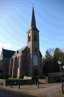 Haan weer terug op de toren van de R.K. Kerk van Bredevoort.